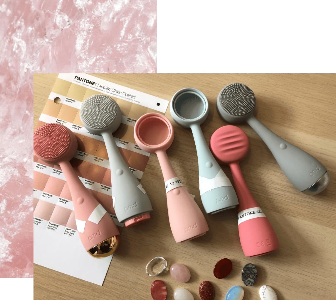 Assortment of PMD products laid on top of printed color palette